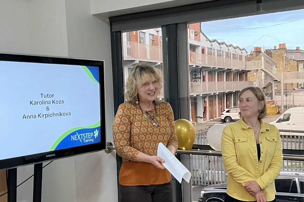 Two tutors presenting at the NextStep Apprenticeship Award Ceremony.