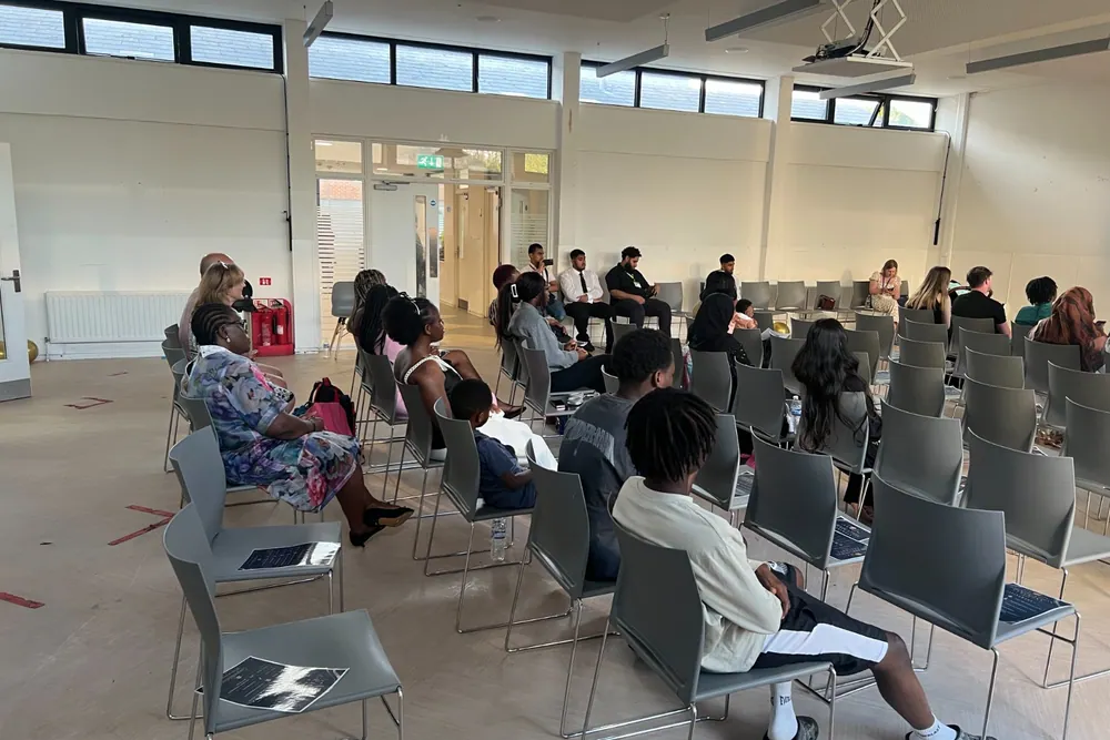 A seated audience gathered for a NextStep event.